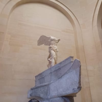 The Winged Victory of Samothrace statue at the Louvre.
